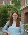 Picture of Lauren Seitz, a woman with long red hair